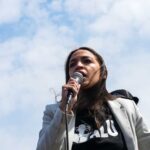 Ocasio-Cortez Under Fire for Disconnecting Political Talk from Tesla Violence