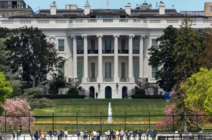 2505508195 The White House with tourists in the foreground.