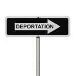 Deportation Tsunami Leaves Farms in Chaos Black sign with deportation and rightpointing arrow
