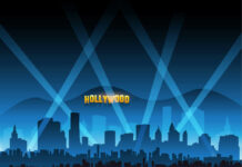 Hollywood skyline with red carpet and spotlights