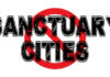 Text reading Sanctuary Cities crossed out in red