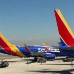 Southwest Airlines planes parked at an airport