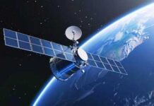 Satellite orbiting Earth with solar panels visible