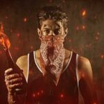 Firebomb Nightmare Shocks Texas Suburb Person holding a lit molotov cocktail in an urban environment