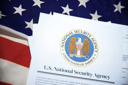 shutterstock_2574428917.jpg U.S. National Security Agency document on an American flag background