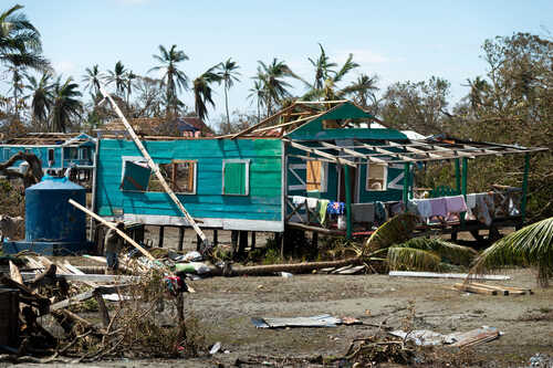 Damaged house in a tropical area after a hurricane