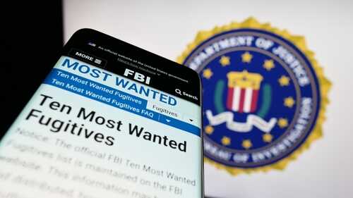 Smartphone displaying FBI's Ten Most Wanted Fugitives webpage