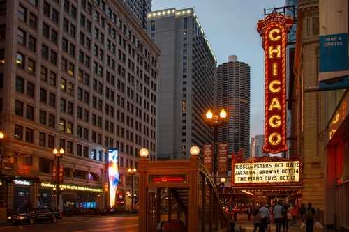 Chicago theater marquee illuminated at dusk