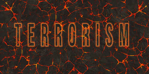 shutterstock_339138782.jpg The word 'TERRORISM' displayed in bold with fiery effects on a dark background