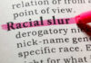 Racial Slur Fallout: Will Texas Dem Survive? Highlighted definition of 'racial slur' in a dictionary