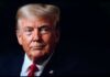 Trump Night Starts With Unexpected Power Moment Close-up portrait of a man with a serious expression wearing a suit