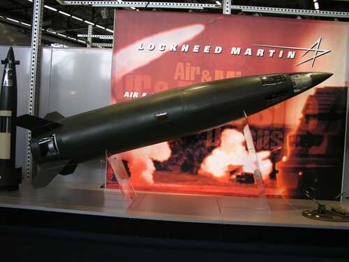 A missile model displayed at a trade show with Lockheed Martin branding