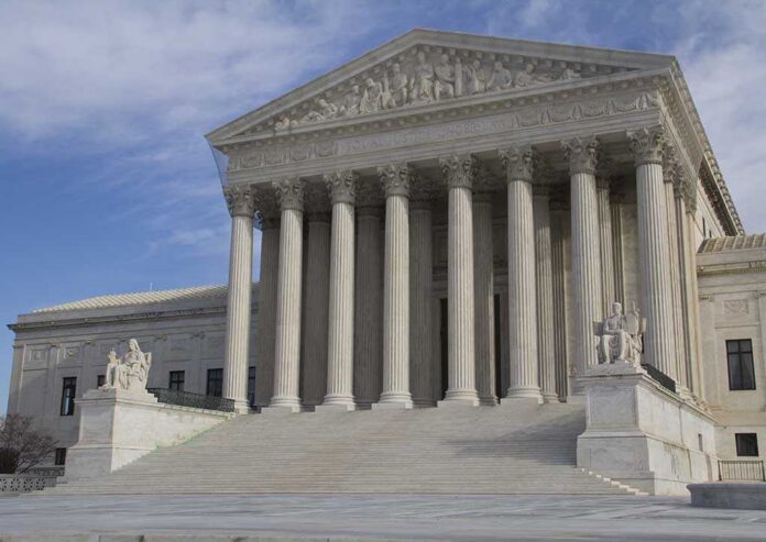 Usa,Supreme,Court,Building,In,Washington,,D.c.,With,A,Cloudy United States Supreme Court building with grand columns and steps