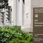 Family Feud Explodes Inside DOJ Exterior view of the Robert F. Kennedy Department of Justice Building with a sign