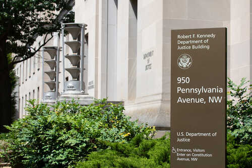 Washington,,Dc,-,June,23,,2019:,Sign,For,The,U.s. Exterior view of the Robert F. Kennedy Department of Justice Building with a sign