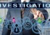 Businessman pointing at investigation themed icons