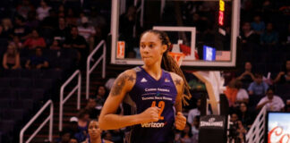Basketball players on court during a game