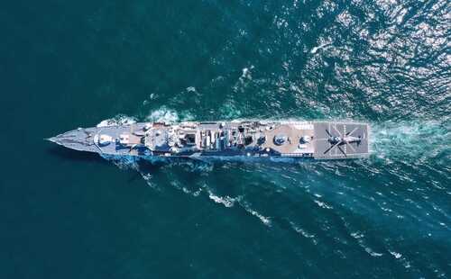 Aerial,View,Of,Naval,Ship,,Battle,Ship,,Warship,,Military,Ship Aerial view of a naval ship navigating through the ocean
