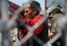 Wrong House, Dead Student Individual at a border fence with law enforcement officers nearby