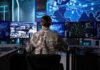 Mystery Spy Planes Stalk US Border Military personnel monitoring multiple screens in a command center