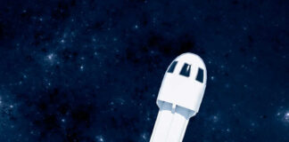 Rocket launching into space over snowy landscape
