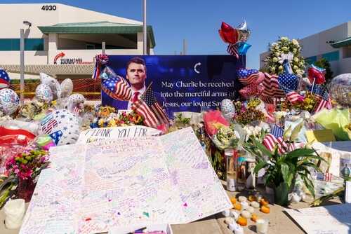 Phoenix,,Arizona,-,September,13,,2025:,People,Pay,Tribute,At A memorial with flowers, balloons, and a tribute banner honoring someone named Charlie